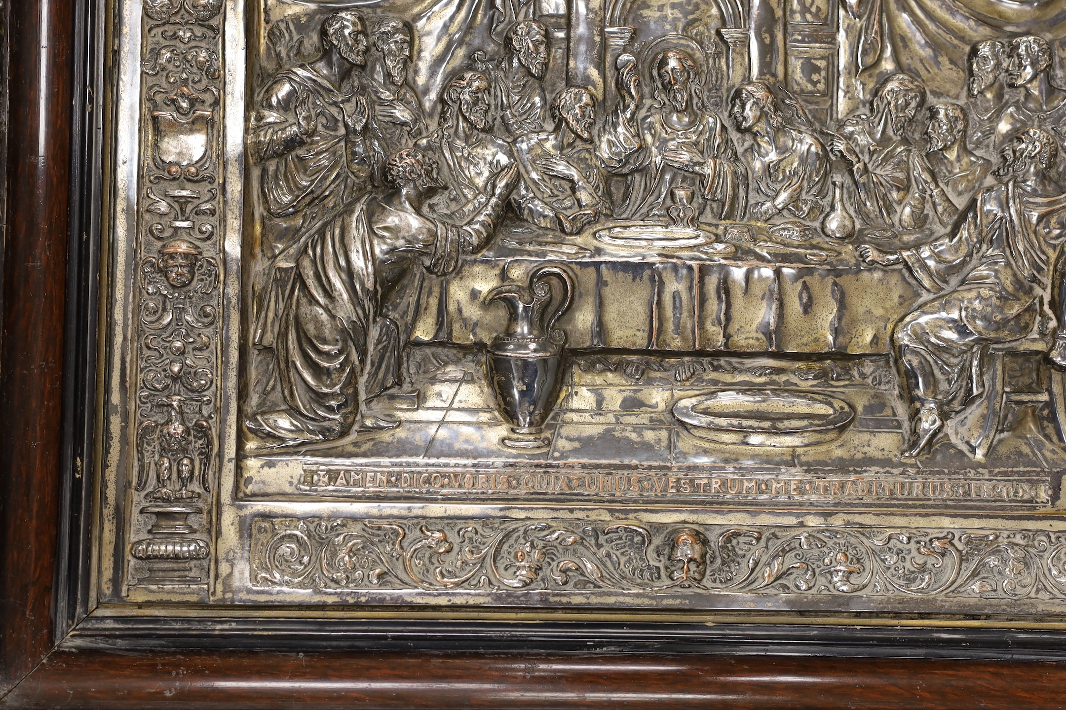 A framed embossed plaque, The Last Supper, silver plate on copper, 34.5 x 50cm excl frame